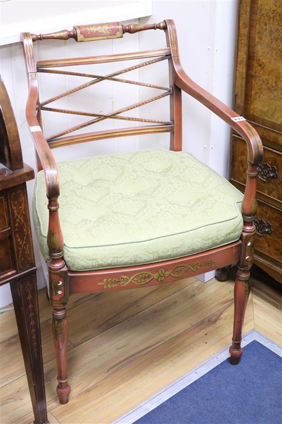 A pair of Sheraton style polychrome painted and gilt open armchairs, with lattice backs